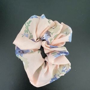 pink scrunchie w/ blue flowers and green stems